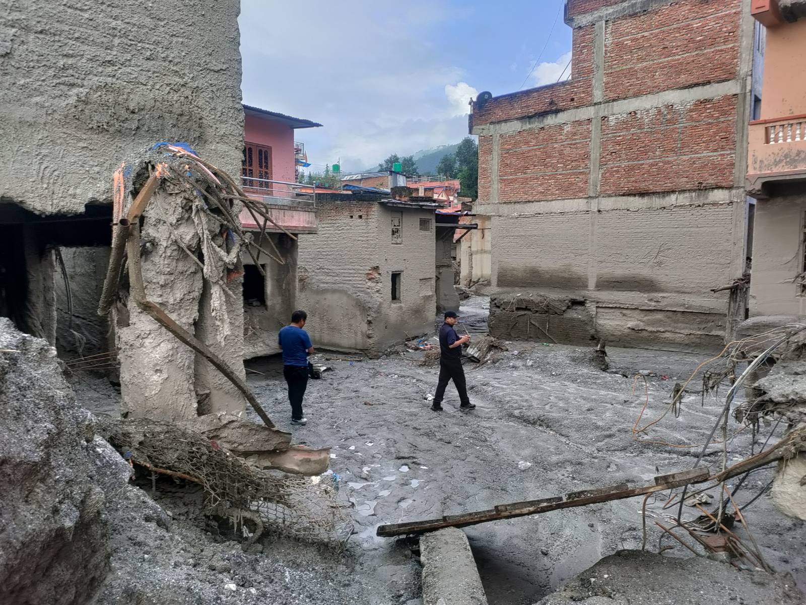 Flood-damaged road and river area in northern Nepal